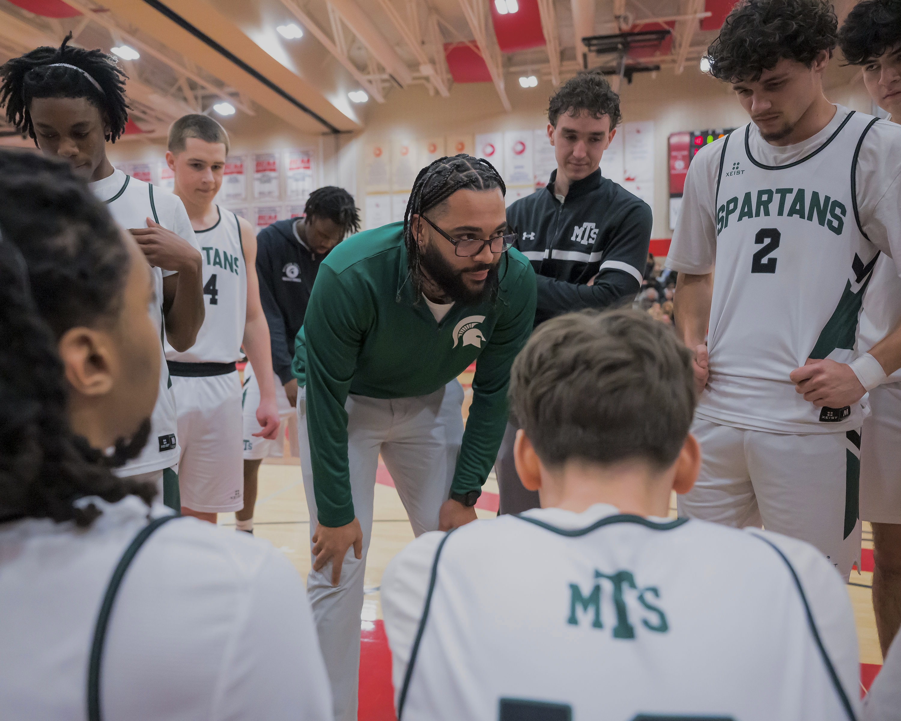 Coach AD in the huddle